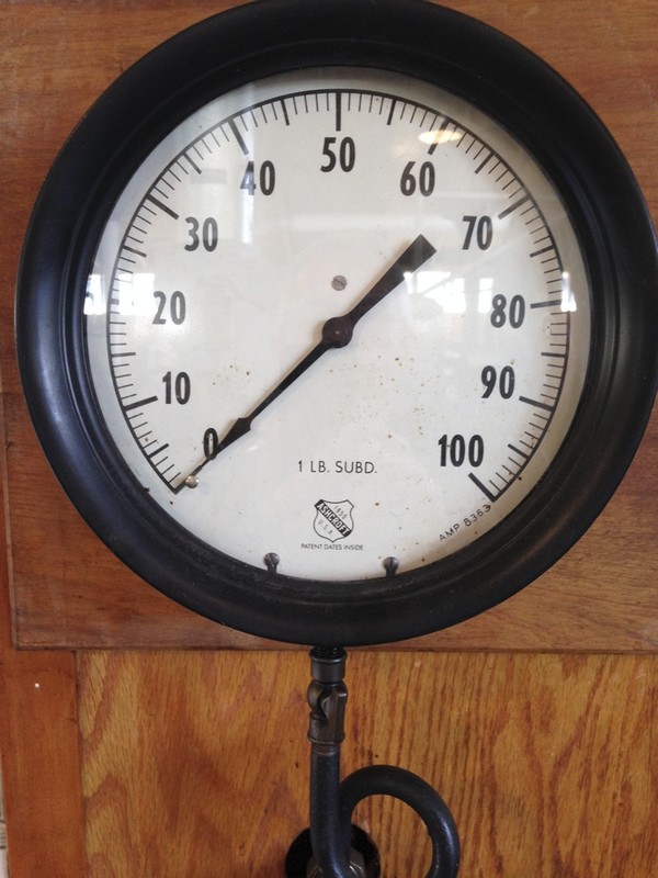 Steam pressure gauge labeled "Ashcroft". Scale 0-100.